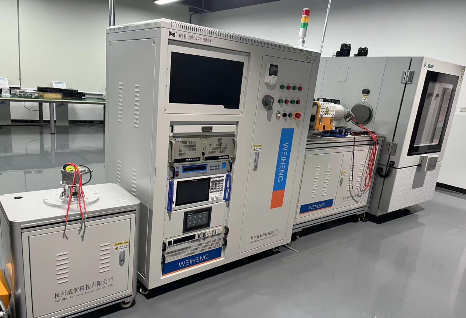 Original Weiheng automotive steering motor test system with control cabinet, motor fixture, loading equipment, and environmental enclosure
