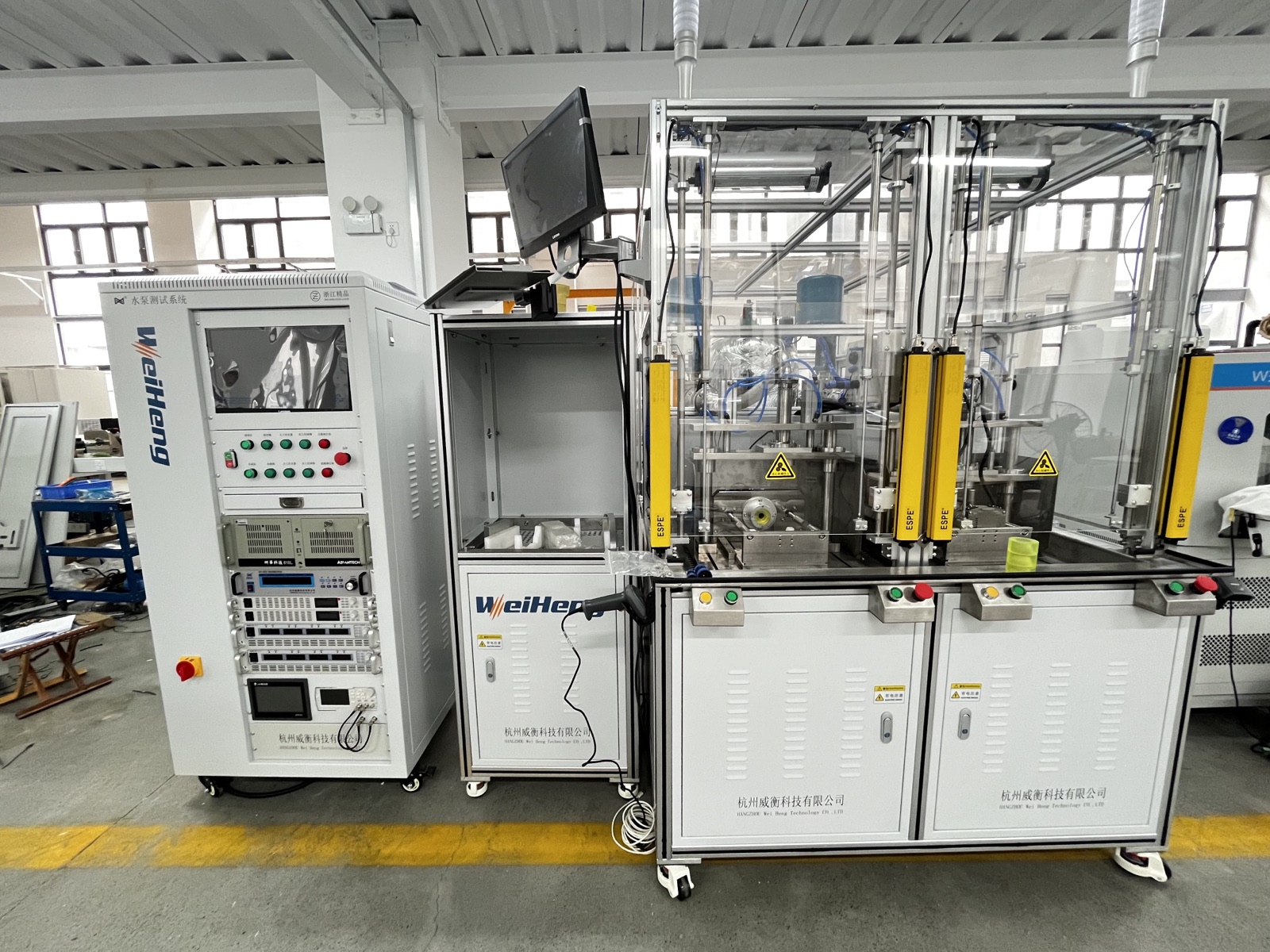 Weiheng pump performance test system with control cabinet, enclosed stations, fixtures, and safety devices